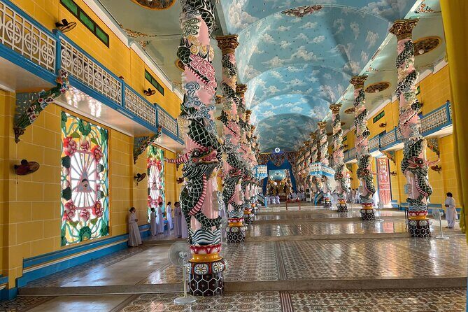 1-Day Tay Ninh– Cao Dai Temple & Cu Chi Tunnels Tour - Cao Dai Temple at midday: watching a living religion