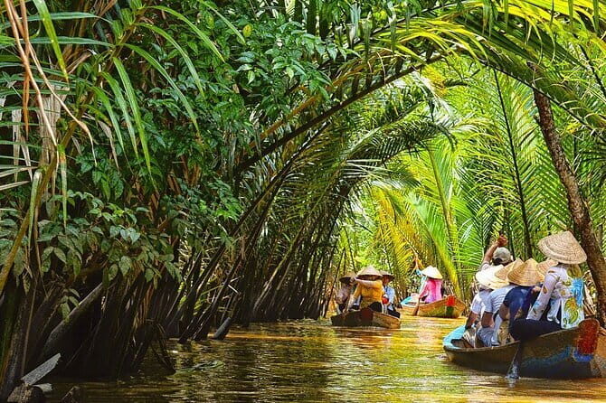 Cu Chi & Mekong Delta Day tour - Honey tea, fruit tasting, singing, and coconut candy