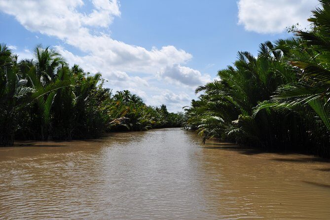 Cu chi Tunnel & Mekong Delta Full Day BBQ Lunch Lux Group 10 pax - Cu Chi Tunnels: The day starts with Vietnam’s underground problem-solving