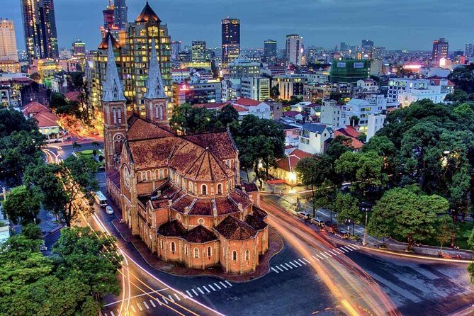 Cu Chi Tunnels and Ho Chi Minh City Full Day Trip - Getting to Cu Chi: countryside views with a darker backdrop