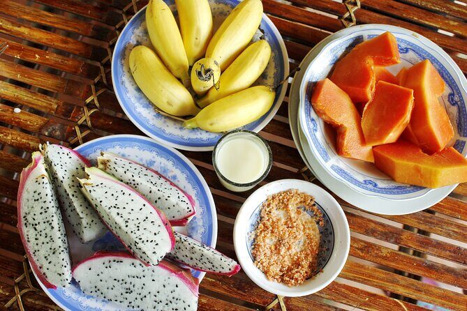 Cu Chi Tunnels and Mekong Delta 1 Day Tour from Ho Chi Minh City - Coconut sweets, rice paper, and the small production stops that make it feel local