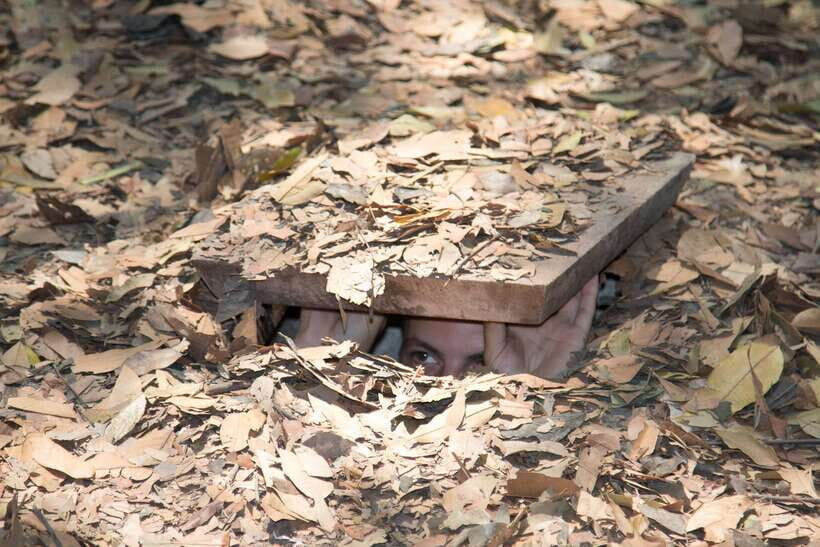 Cu Chi Tunnels Half-Day: Big Group Vietnam War Experience - A guided crawl through kitchens, hospitals, and hidden passages