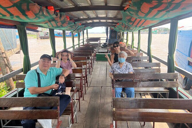 Full Day Cu Chi Tunnel and Mekong Delta Small Group with Lunch - Cu Chi Tunnels: documentary first, entrance included